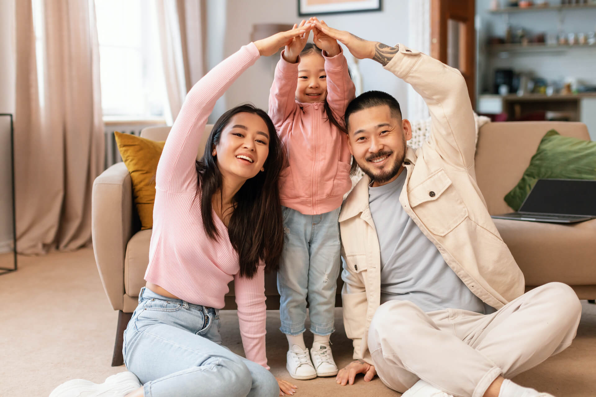 asian-family-with-child-celebrating-homeownership-2023-05-12-21-05-26-utc.jpg